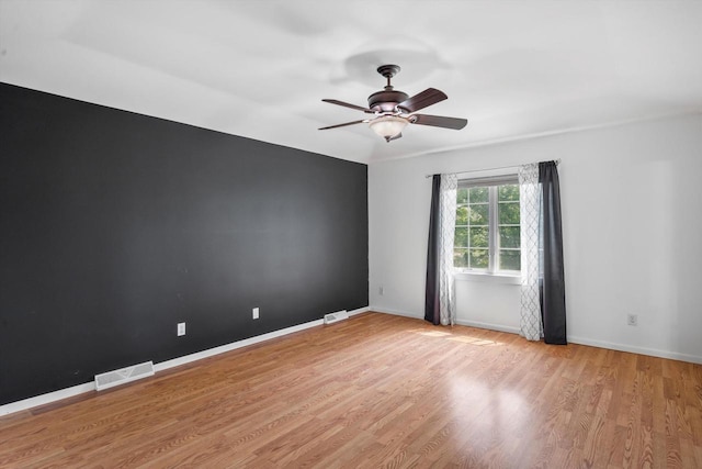 6650 N 114th St, Milwaukee, WI 53224 - empty room with light wood-type flooring, ceiling fan, and baseboards