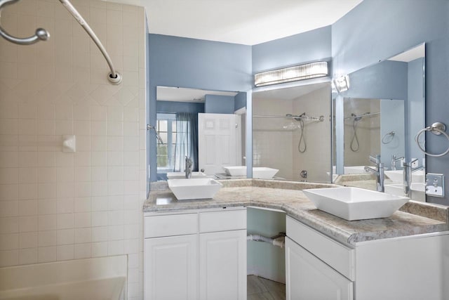 6650 N 114th St, Milwaukee, WI 53224 - bathroom featuring double vanity and bathtub / shower combination