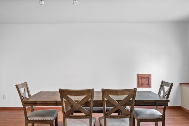 6650 N 114th St, Milwaukee, WI 53224 - dining area featuring wood finished floors and baseboards