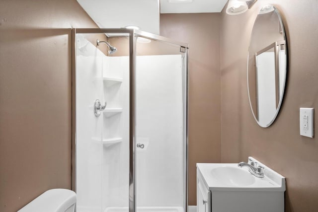 6650 N 114th St, Milwaukee, WI 53224 - bathroom with a shower stall, vanity, and toilet
