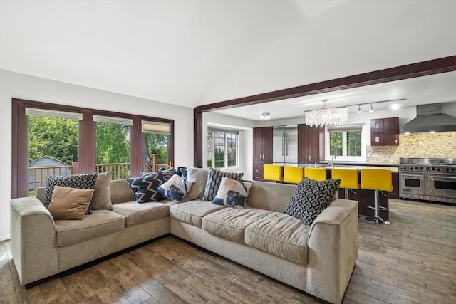 6650 N 114th St, Milwaukee, WI 53224 - living room with hardwood / wood-style flooring, a chandelier, and lofted ceiling