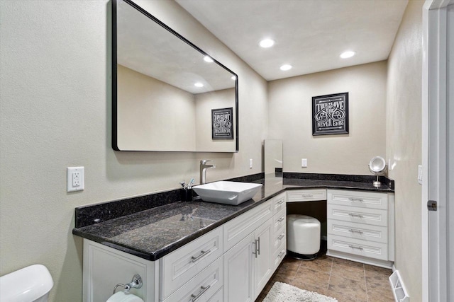 4441 N John Paul Rd, Milton, WI 53546 - bathroom featuring vanity, toilet, and recessed lighting