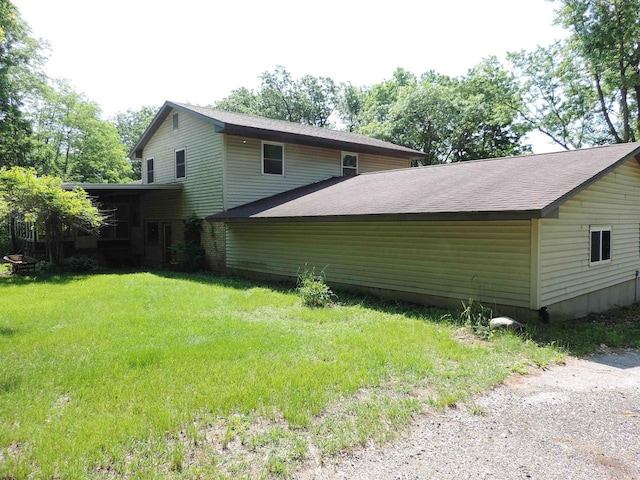 422 E Catherine St, Muscoda, WI 53573 - view of side of property with roof with shingles and a yard
