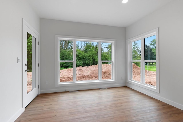 3566 W Hank Ave, De Pere, WI 54115 - empty room with baseboards, light wood-style flooring, and recessed lighting