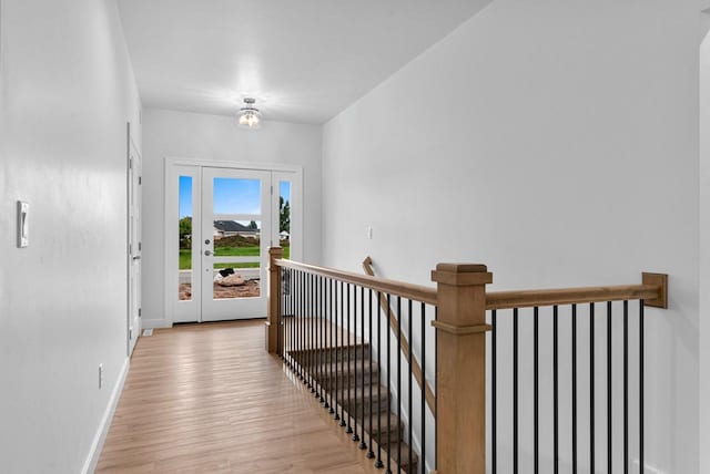 3566 W Hank Ave, De Pere, WI 54115 - hallway featuring an upstairs landing, light wood finished floors, and baseboards