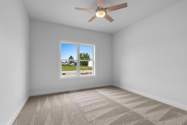 3566 W Hank Ave, De Pere, WI 54115 - carpeted spare room featuring baseboards and ceiling fan