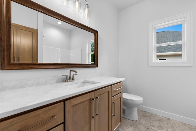 3566 W Hank Ave, De Pere, WI 54115 - bathroom featuring vanity, healthy amount of natural light, toilet, and baseboards