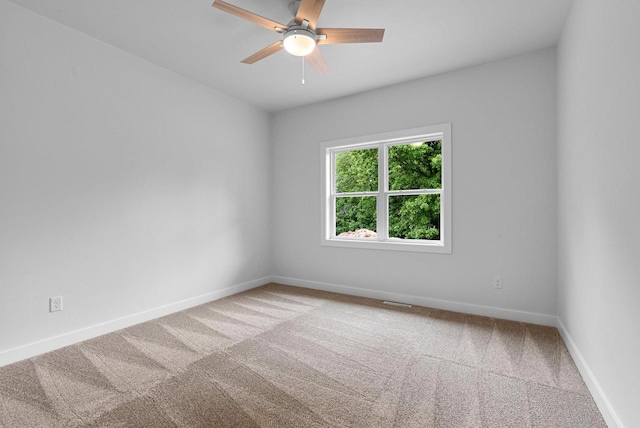 3566 W Hank Ave, De Pere, WI 54115 - spare room with carpet flooring, baseboards, and a ceiling fan