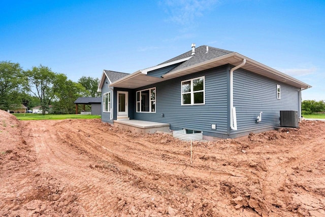 3566 W Hank Ave, De Pere, WI 54115 - back of property with cooling unit and roof with shingles