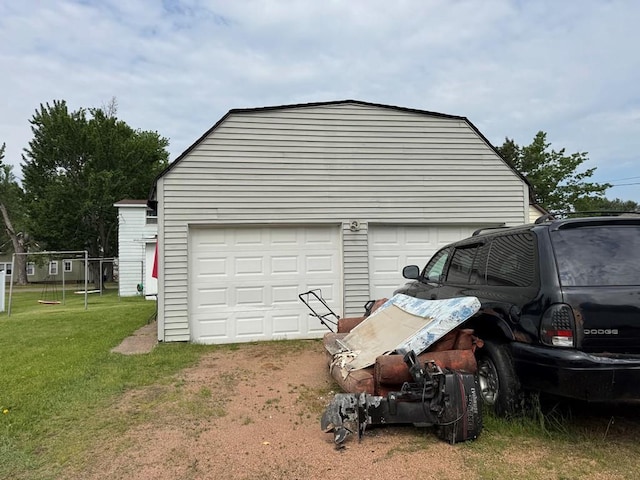 205 N Thomas St, Merrill, WI 54452 - garage featuring driveway