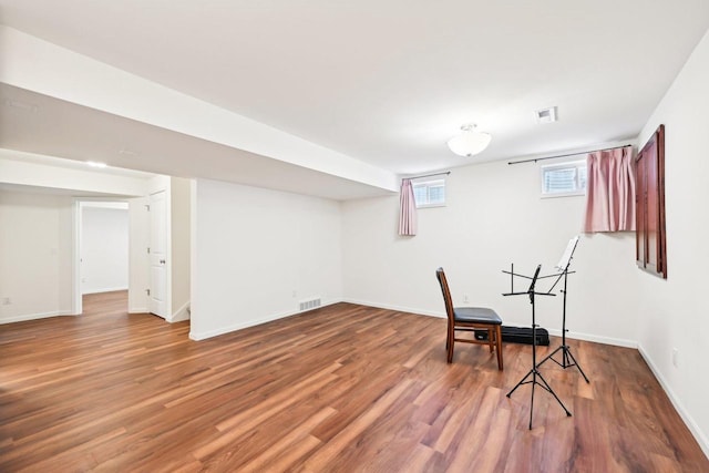 2418 Leopold Way, Sun Prairie, WI 53590 - sitting room with wood finished floors and baseboards