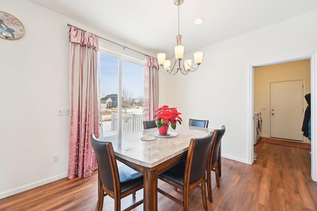2418 Leopold Way, Sun Prairie, WI 53590 - dining space with a chandelier, washing machine and clothes dryer, baseboards, dark wood-style flooring, and recessed lighting