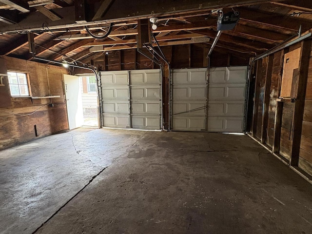 230 Park Ave, Wisconsin Rapids, WI 54495 - garage featuring a garage door opener