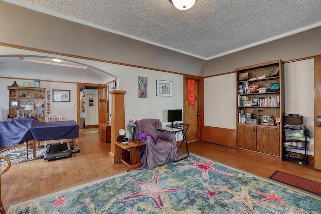 1107 S 71st St Unit 1109, West Allis, WI 53214 - office space with arched walkways, wood finished floors, and a textured ceiling