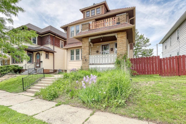 1107 S 71st St Unit 1109, West Allis, WI 53214 - american foursquare style home with a balcony and covered porch