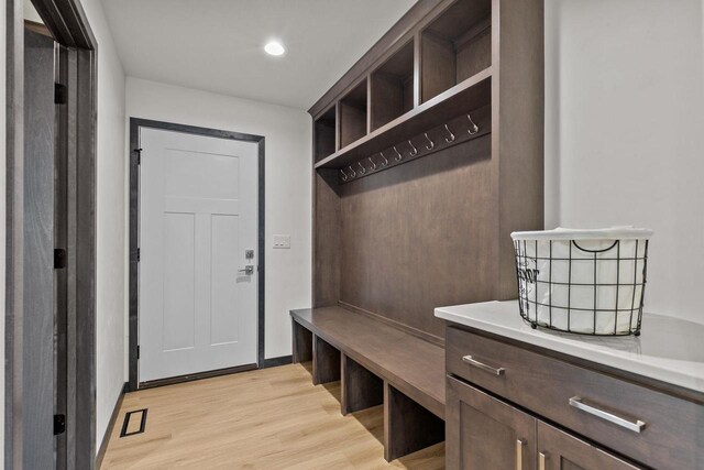 1338 Highland Ridge Dr, De Pere, WI 54115 - mudroom featuring light wood-style floors and recessed lighting