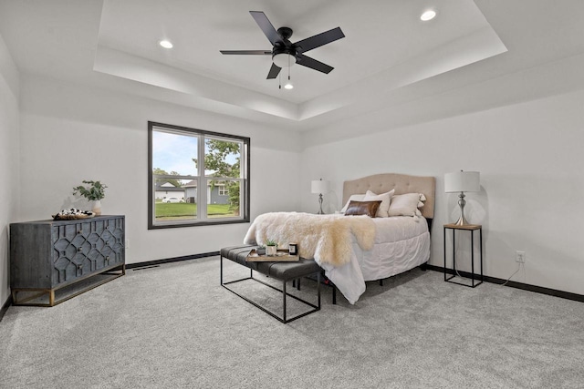 1338 Highland Ridge Dr, De Pere, WI 54115 - bedroom featuring a tray ceiling, carpet flooring, baseboards, recessed lighting, and a ceiling fan
