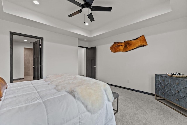 1338 Highland Ridge Dr, De Pere, WI 54115 - bedroom with carpet flooring, recessed lighting, a raised ceiling, baseboards, and ceiling fan