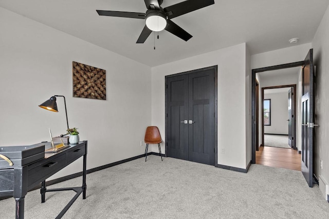 1338 Highland Ridge Dr, De Pere, WI 54115 - office area featuring light colored carpet, ceiling fan, and baseboards