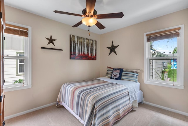 6619 W Fremont Pl, Milwaukee, WI 53219 - bedroom with carpet floors and a ceiling fan