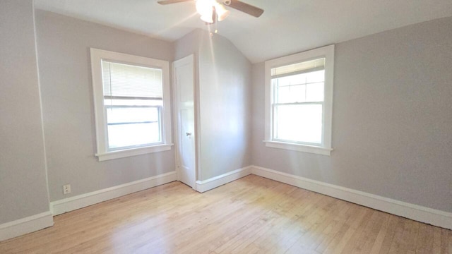 5415 N 36th St, Milwaukee, WI 53209 - spare room with wood finished floors, a ceiling fan, baseboards, plenty of natural light, and lofted ceiling
