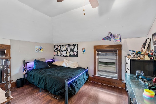 1439 Parkview Dr, Kewaskum, WI 53040 - bedroom with vaulted ceiling, wood finished floors, and a ceiling fan