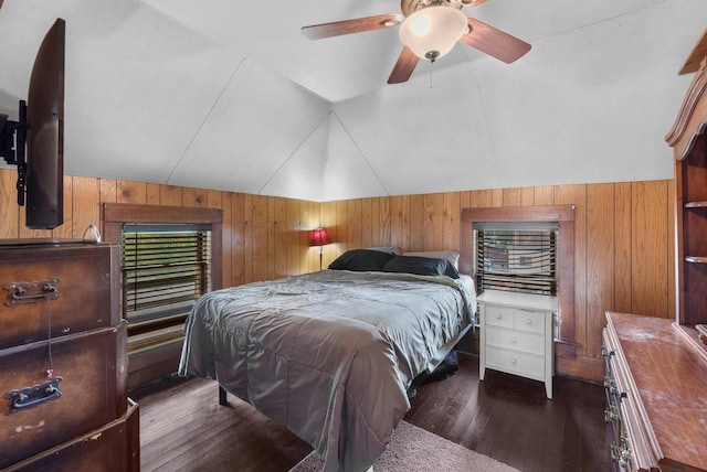 1439 Parkview Dr, Kewaskum, WI 53040 - bedroom with vaulted ceiling, wood walls, dark wood finished floors, and a ceiling fan