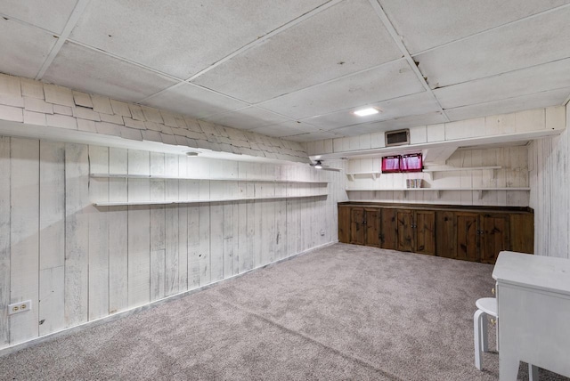 1439 Parkview Dr, Kewaskum, WI 53040 - bar featuring wooden walls, carpet, and a drop ceiling
