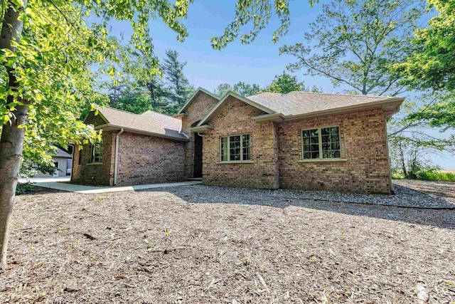1830 Pine Tree Ct, Luxemburg, WI 54217 - ranch-style house with brick siding and roof with shingles