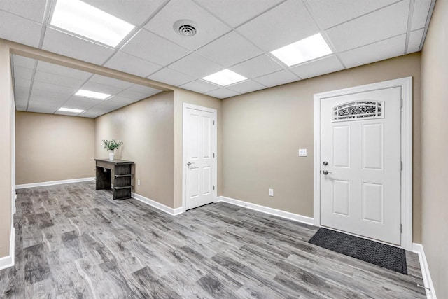 1830 Pine Tree Ct, Luxemburg, WI 54217 - entryway with a drop ceiling, wood finished floors, and baseboards