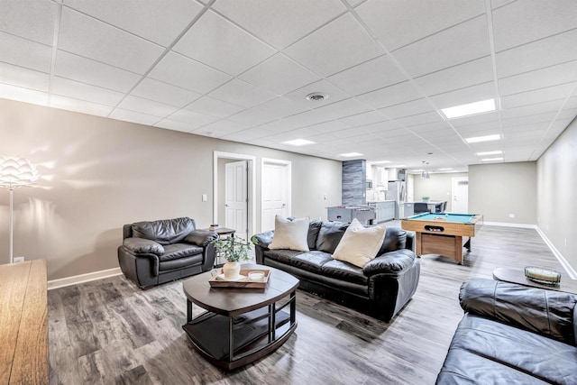 1830 Pine Tree Ct, Luxemburg, WI 54217 - living area featuring baseboards, wood finished floors, pool table, and a paneled ceiling