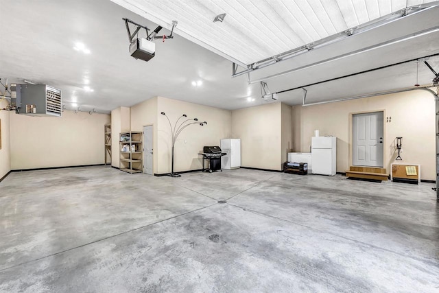 1830 Pine Tree Ct, Luxemburg, WI 54217 - garage featuring freestanding refrigerator, a garage door opener, and a heating unit