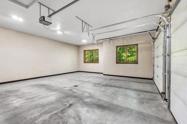 1830 Pine Tree Ct, Luxemburg, WI 54217 - garage featuring a garage door opener