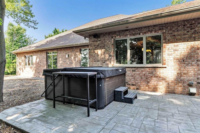 1830 Pine Tree Ct, Luxemburg, WI 54217 - view of patio with a hot tub
