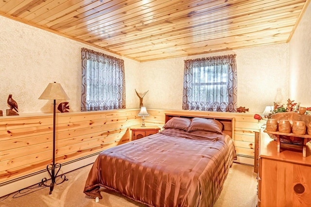 N9570 Sunset Dr, East Troy, WI 53120 - bedroom with wood ceiling, ornamental molding, carpet flooring, a textured wall, and baseboard heating