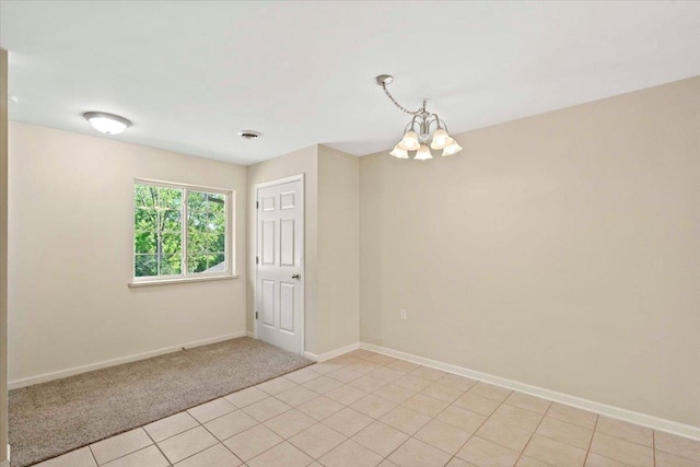 5118 Walbridge Ave, Madison, WI 53714 - spare room with a chandelier and light carpet