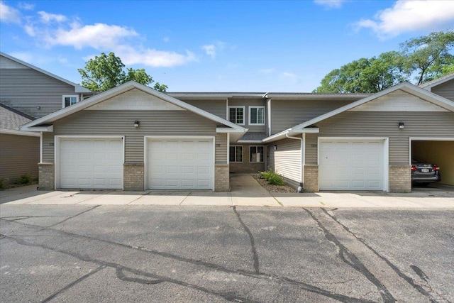 5118 Walbridge Ave, Madison, WI 53714 - multi unit property featuring brick siding and a garage