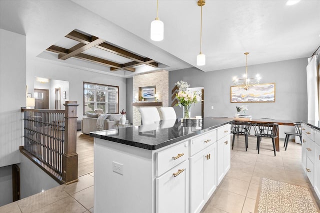 4835 W Jack Pine Ct, Appleton, WI 54913 - kitchen featuring coffered ceiling, beam ceiling, light tile patterned floors, a center island, and white cabinetry