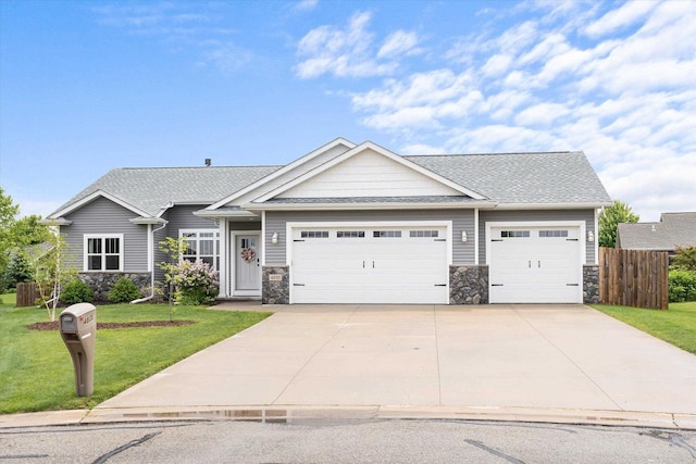4835 W Jack Pine Ct, Appleton, WI 54913 - craftsman-style house featuring stone siding, an attached garage, concrete driveway, and a shingled roof