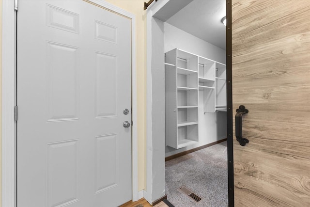 4835 W Jack Pine Ct, Appleton, WI 54913 - mudroom with baseboards and carpet