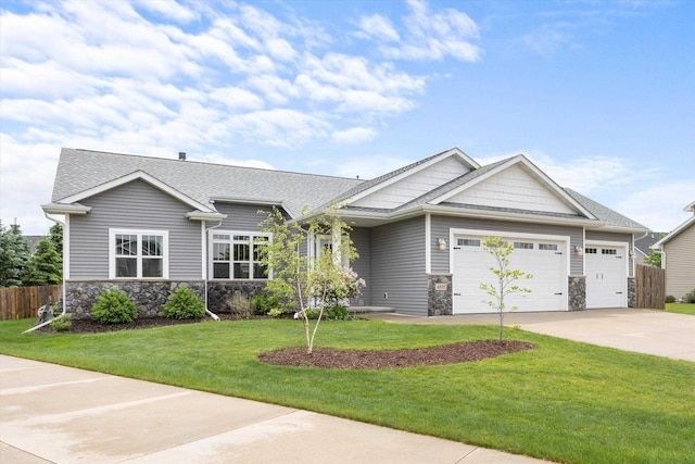4835 W Jack Pine Ct, Appleton, WI 54913 - craftsman-style house with stone siding, concrete driveway, an attached garage, and roof with shingles