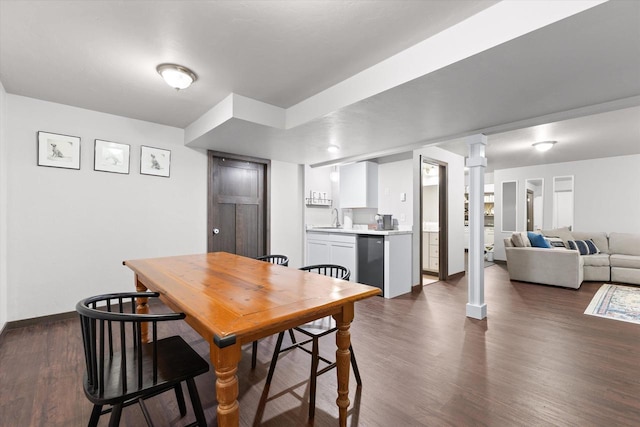 4835 W Jack Pine Ct, Appleton, WI 54913 - dining space with baseboards, decorative columns, dark wood-type flooring, and bar area