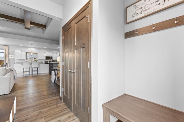 4835 W Jack Pine Ct, Appleton, WI 54913 - mudroom featuring beam ceiling and light wood-style flooring