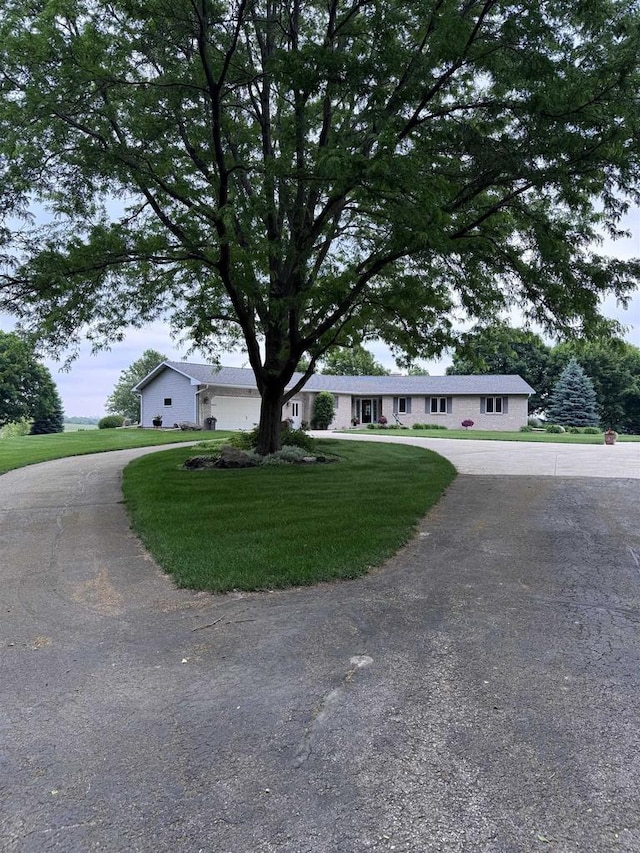 N2068 Alphorn Rd, Monroe, WI 53566 - ranch-style home featuring a front lawn and driveway