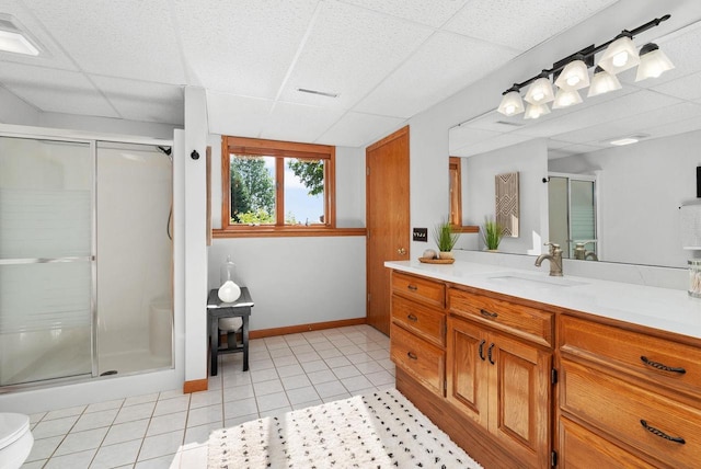 N2068 Alphorn Rd, Monroe, WI 53566 - bathroom featuring vanity, a shower stall, tile patterned flooring, and a paneled ceiling