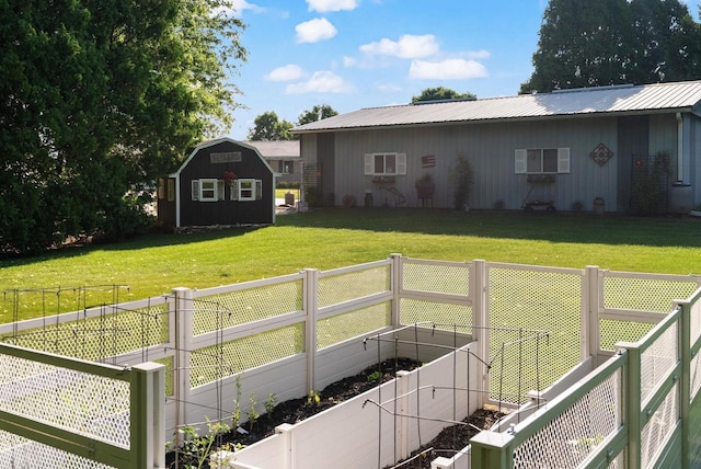 N2068 Alphorn Rd, Monroe, WI 53566 - rear view of property featuring a metal roof, a fenced backyard, and a storage unit