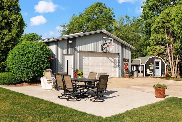 N2068 Alphorn Rd, Monroe, WI 53566 - view of patio / terrace featuring a garage and a storage unit