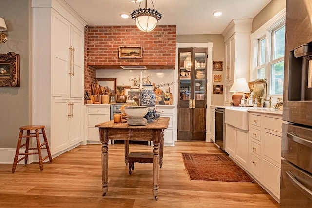72 W Mill St, Winona, MN 55987 - home office with light wood-style floors and recessed lighting