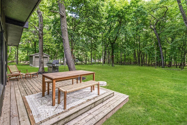 1418 Mill Rd, Delafield, WI 53018 - deck featuring an outbuilding, a lawn, area for grilling, and outdoor dining area