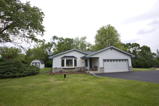 11426 W Woods Rd, Franklin, WI 53132 - single story home featuring asphalt driveway, an attached garage, and a front yard